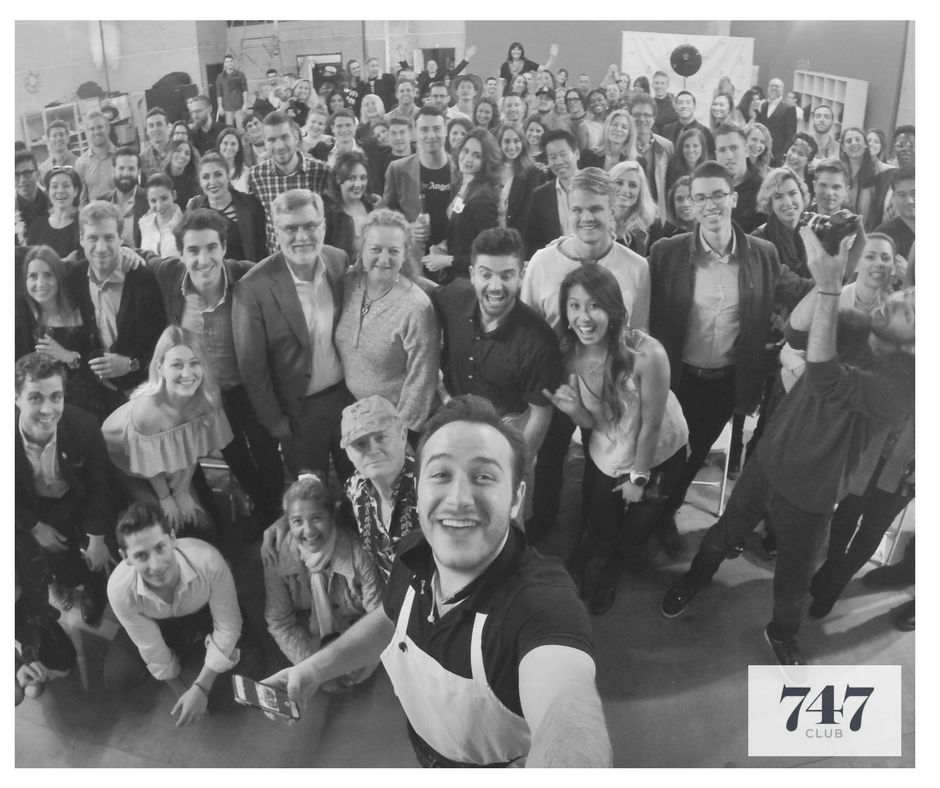 Guests gathered around a 7:47 dinner table
